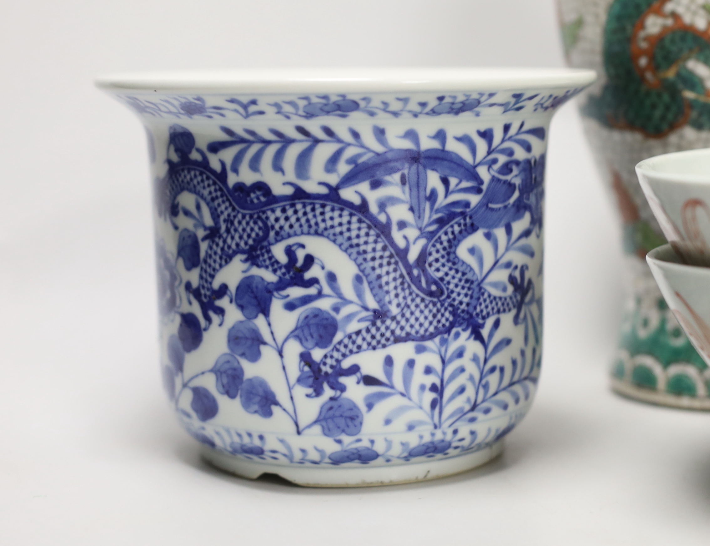 Two Chinese bowls, two blue and white dragon planters and a crackleware vase, tallest 22.5cm